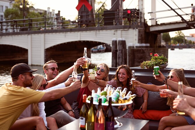 Amsterdam Private Boat Tour with Unlimited Drinks - The 90-minute route: Amsterdam highlights without the full-day commitment