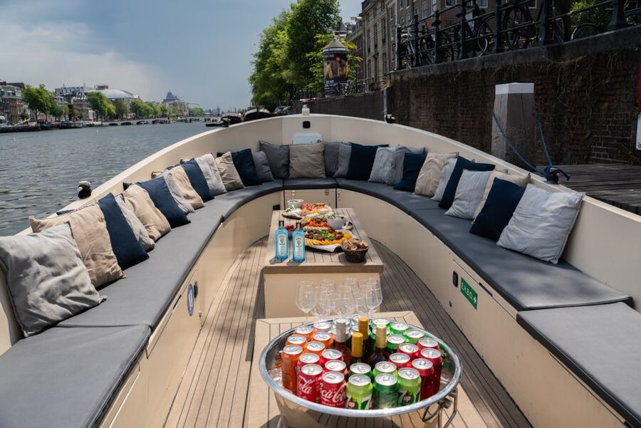 Amsterdam: Private Canal Booze Cruise with Unlimited Drinks - Amstel 178 pickup and getting on board without stress
