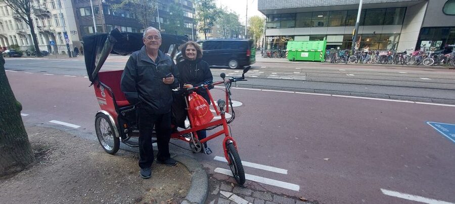 Amsterdam: Private City Highlights Tour by Rickshaw - Chinatown and Nieuwmarkt, street life between food stops and canals