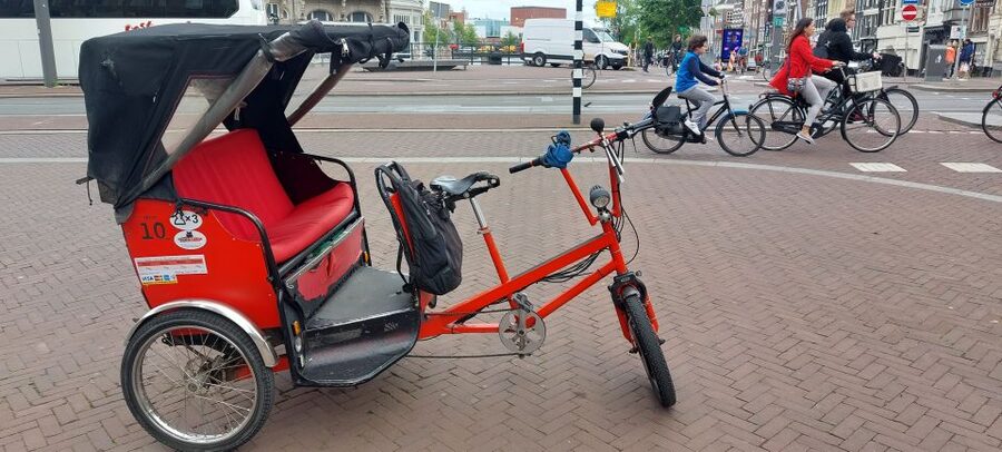 Amsterdam: Private City Highlights Tour by Rickshaw - Comfort and logistics on a pedicab: what to plan for