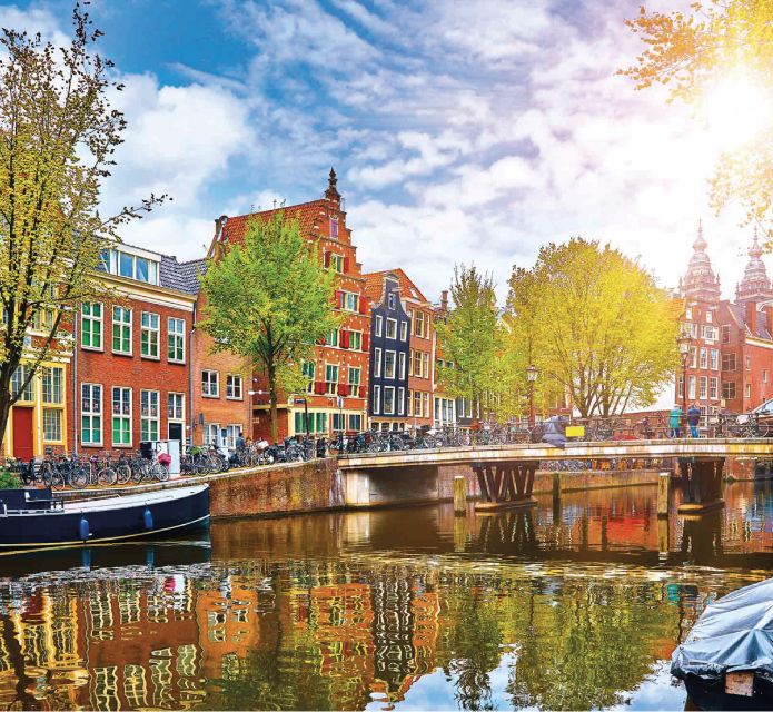 Amsterdam: Private Guided City Tour by Pedicab - IJ Bay and Damrak to Dam Square: Amsterdam’s Big-Entrance Energy