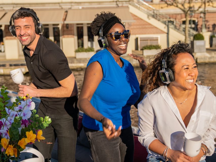 Amsterdam: Private Luxury Cruise with Drinks & Silent Disco - Drinks on Board: Unlimited Beer, Wine, and Soda, With One Caveat