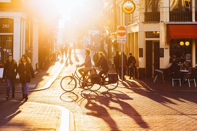 Amsterdam Private Tour: Highlights & Hidden Gems by Bike or Foot - Where you start in Amsterdam, and how the pace really feels