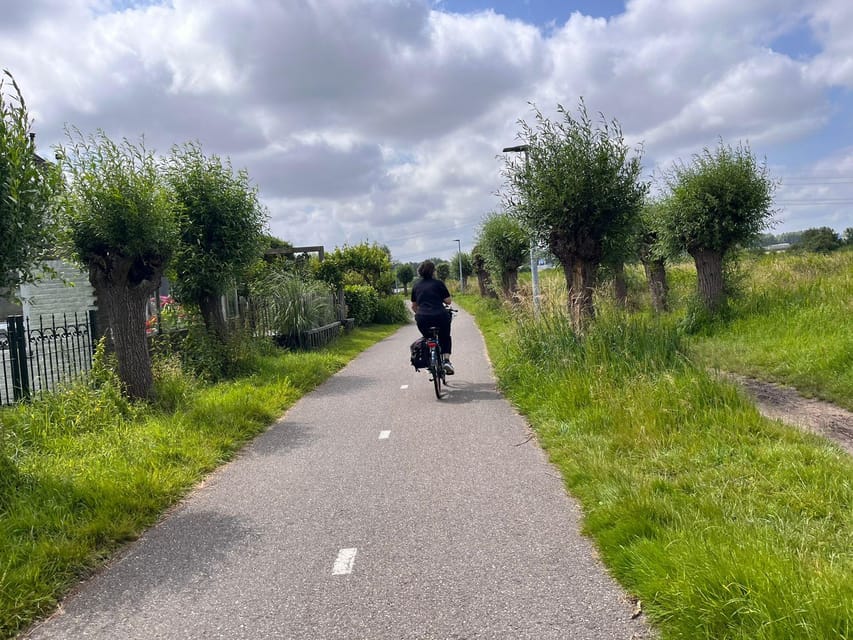 Amsterdam: Rainbow Rural Bike Tour With Local Gay Guide - Bike rental and what “easy” means in flat Holland