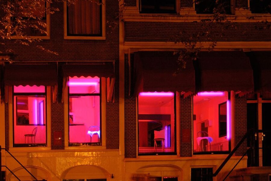 Amsterdam: Red Light District 1-hour Smartphone Audio Tour - Dam Square context: the start point that explains why Amsterdam looks the way it does