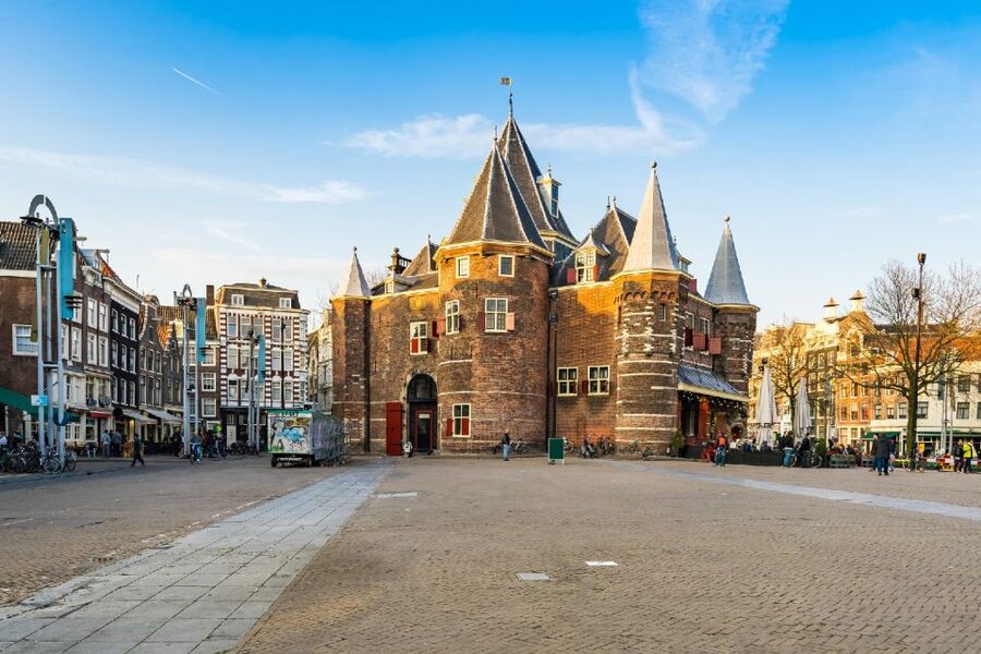 Amsterdam: Red Light District 1-hour Smartphone Audio Tour - The walk route: Dam Square to Nieuwmarkt, with named stops that keep you oriented