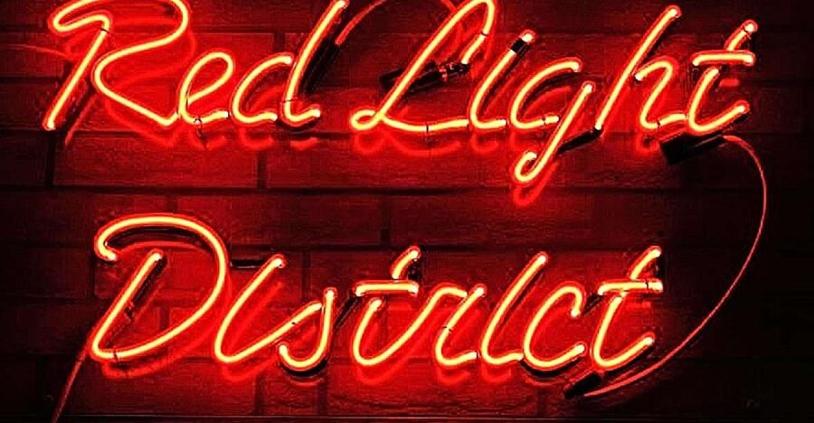 Amsterdam: Red Light District Exclusive Night Tour - Amsterdam Red Light District after dark, why night changes everything