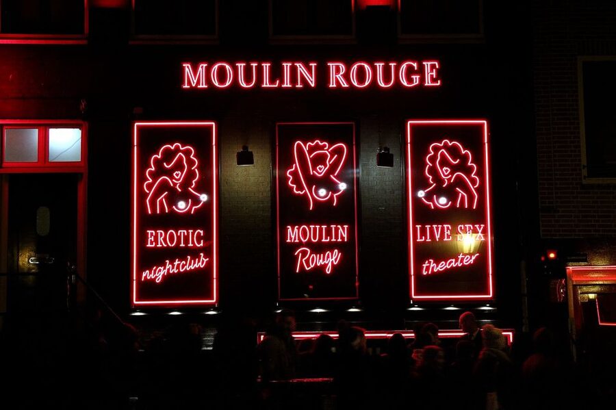 Amsterdam: Red Light District Tour in English or German - Where You Start: Prins Hendrikkade Meeting Points and the Dam Square Finish Zone