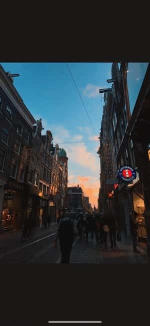 Amsterdam: Red Light District Tour in German/English for groups of 4 or more - The Oude Kerk pause: a landmark break that changes your perspective