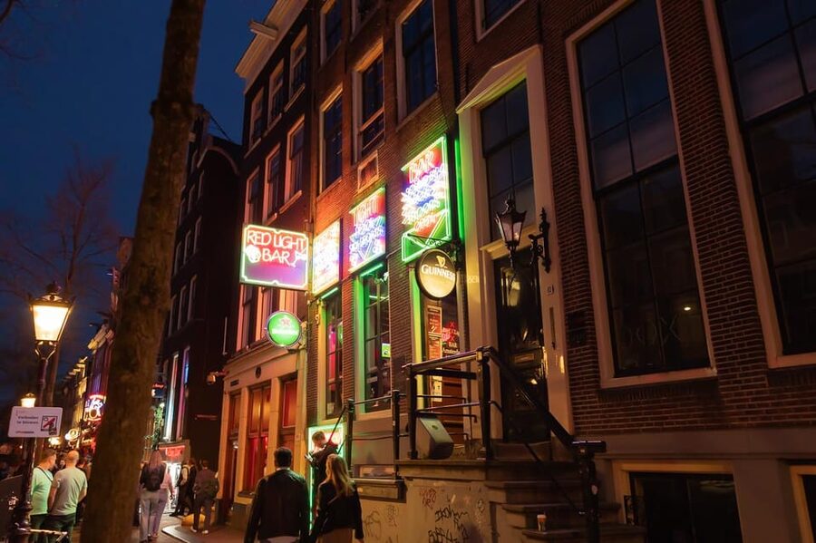 Amsterdam: Red Light Tour Exclusive + Peep Show - The narrowest alley and why it mattered