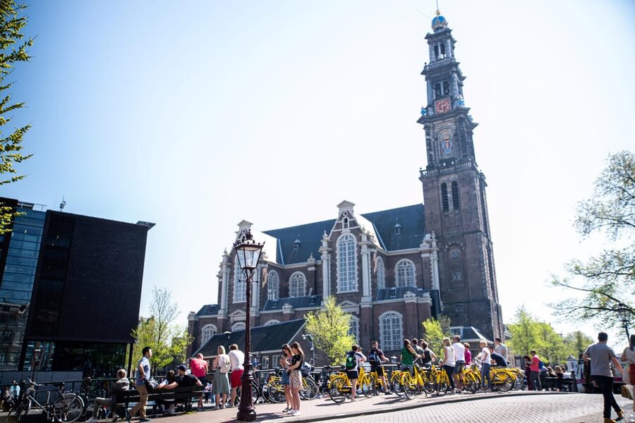 Amsterdam: Relaxed City Highlights Guided Bike Tour - Bikes, safety, and why the max 12 matters in Amsterdam traffic