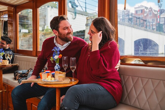 Amsterdam: Romantic Canal Cruise with Optional Bubbles & Bites - Amstel and the bridges: a faster way to grasp how Amsterdam is built