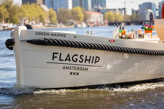 Amsterdam: Saloon Boat Cruise + Unlimited Drinks & Bite option - Drunken Houses and the “how did we see that” canal geometry