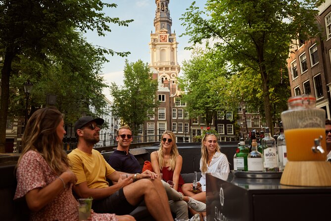 Amsterdam: Saloon Boat Cruise + Unlimited Drinks & Bite option - Boarding, weather, and the boat step you should plan for