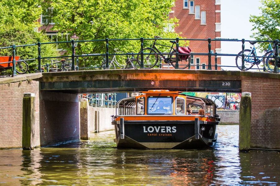 Amsterdam: Semi-Open Canal Boat Cruise - Audio guide in 19 languages, and why seat position still matters