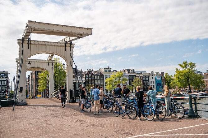 Amsterdam Small-Group Bike Tour With Optional Canal Cruise - Amsterdam Centraal and the “big station” moment you’ll remember
