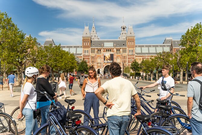 Amsterdam Small-Group Bike Tour With Optional Canal Cruise - De Gooyer Windmill, ARTIS, and the narrowest bridge stop