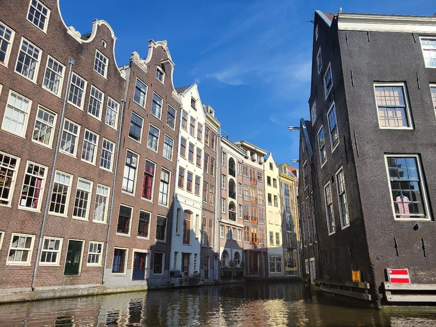 Amsterdam: Small-Group Canal Cruise incl. Drinks and Snacks - The Amstel and Magere Brug: the famous drawbridge moment
