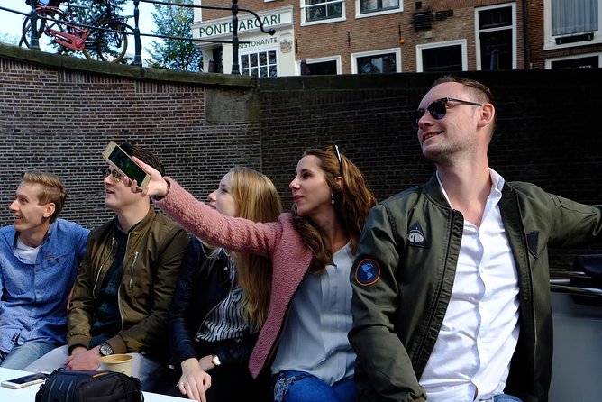 Amsterdam Small-Group Canal Cruise Including Snacks and Drinks - Why this electric open-sloop cruise feels worth the money