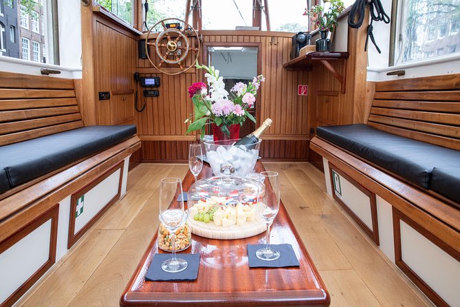 Amsterdam Small-Group Canal Cruise With Dutch Snacks and Drink - Anne Frank House From the Water, Plus Amstel River Views and the Famous Bridge