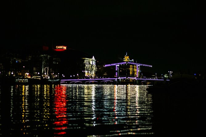 Amsterdam Small-Group Evening Canal Cruise Including Wine, Craft Beer, Cheese - Captains and hosts: what kind of atmosphere you’ll get