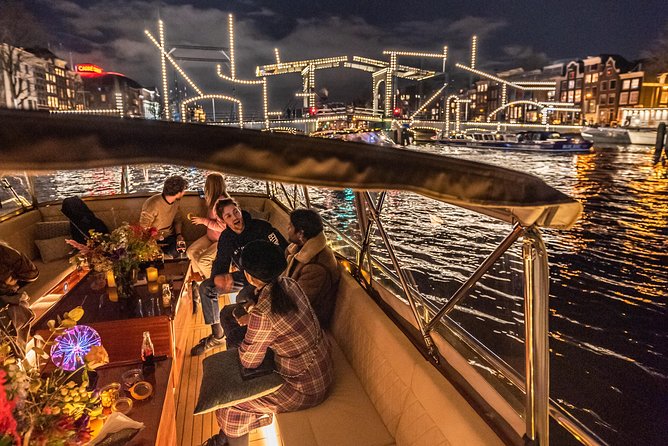 Amsterdam Small-Group Evening Canal Cruise Including Wine, Craft Beer, Cheese - Night views you can actually enjoy, not just rush past