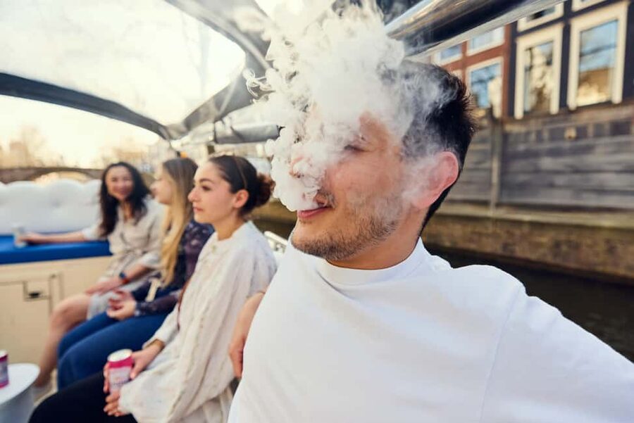 Amsterdam: Smoke & Cruise on covered Cannabis Boat With Bar - Price and Value for a 1-Hour Canal Cruise