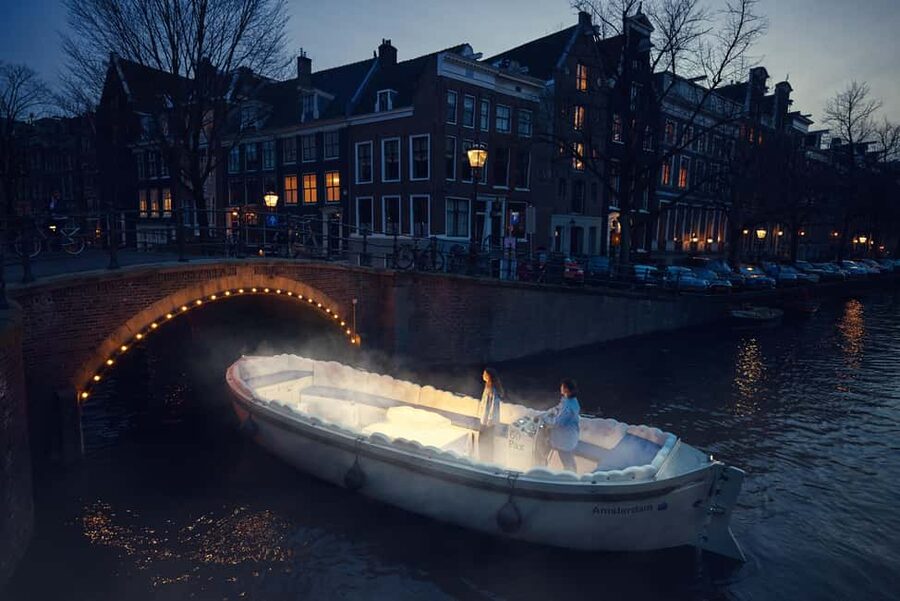 Amsterdam: Smoke & Cruise on covered Cannabis Boat With Bar - Onboard Comfort: Roofed Boat, Bar Drinks, and Staying Warm