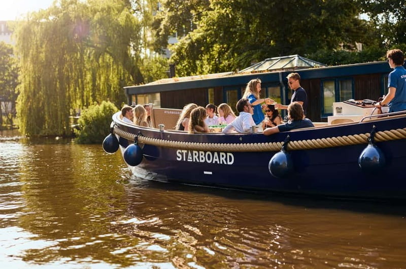 Amsterdam: Spanish Guided Open Boat Cruise with Bar Onboard - Why this electric open-boat cruise feels different in Amsterdam