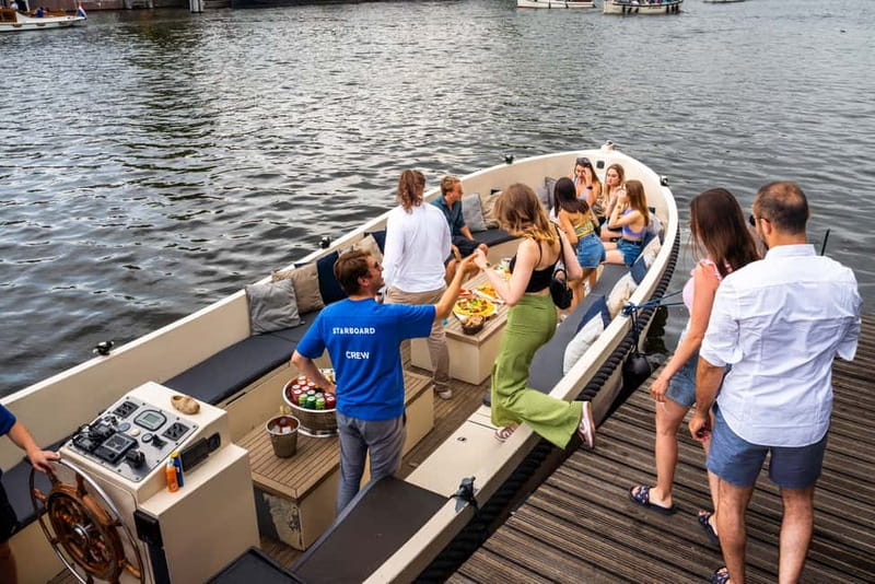 Amsterdam: Spanish Guided Open Boat Cruise with Bar Onboard - The Spanish guide, and how to get the most out of the narration