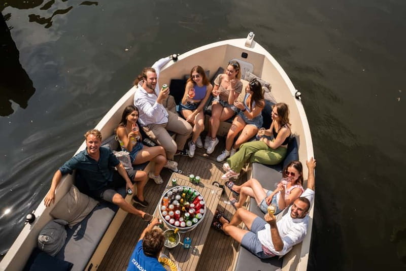 Amsterdam: Spanish Guided Open Boat Cruise with Bar Onboard - Price and value: is $22 worth a one-hour electric canal cruise?