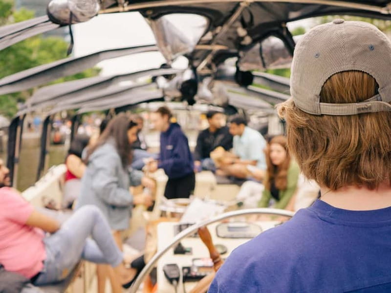 Amsterdam: Spanish Guided Open Boat Cruise with Bar Onboard - Should you book this Amsterdam Spanish canal cruise?