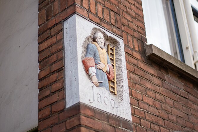 Amsterdam Walking Tour: Urban Legends & History with local guide - Stop 2 and 3, Rembrandtplein and Spui: royal visitors and café clues