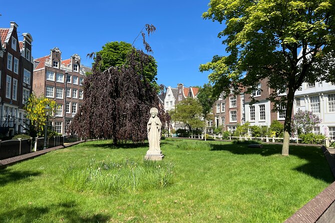 Amsterdam Walking Tour: Urban Legends & History with local guide - Stop 5, Rokin: the Miracle of Amsterdam from the 13th century