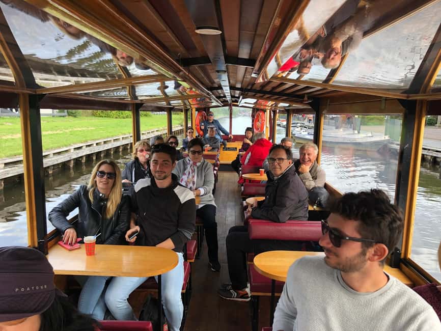 Amsterdam: Zaanse Schans and Giethoorn Guided Combo Tour - Giethoorn arrival: the canal village feeling, plus the cruise that sets the tone