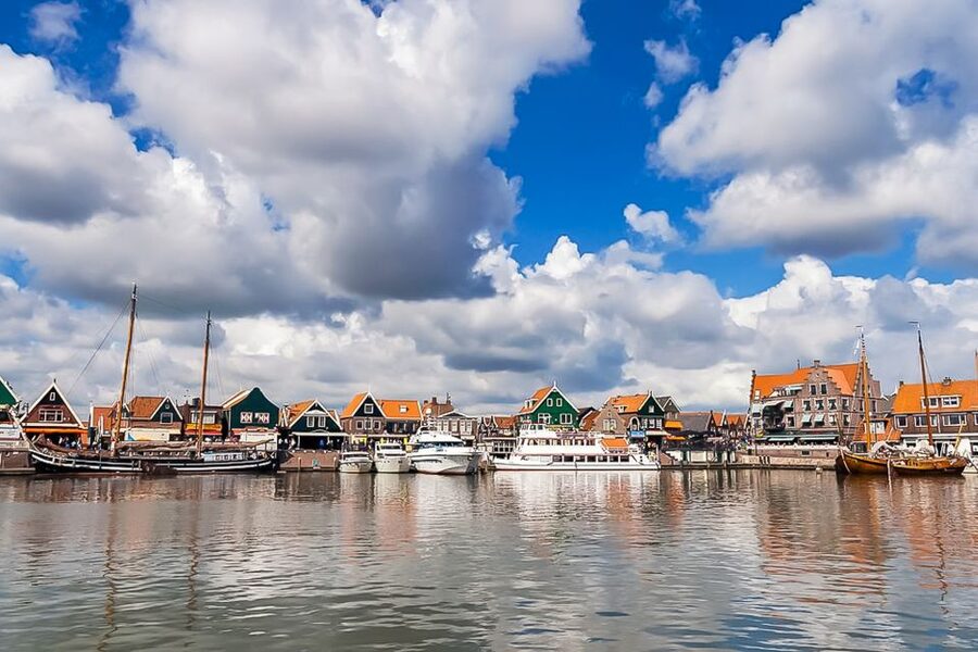 Amsterdam: Zaanse Schans, Edam, Volendam & Marken Bus Tour - Zaanse Schans: windmills, 17th-century houses, and the river Zaan feel