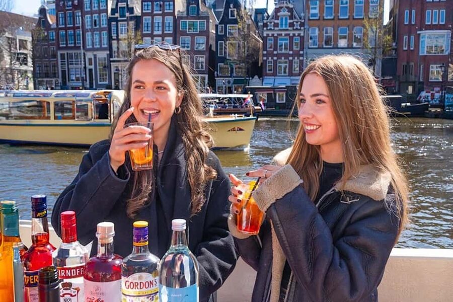 Cheese & Drinks Guided Amsterdam Boat Tour, All Inclusive - The guide and skipper: why the stories can be the whole point