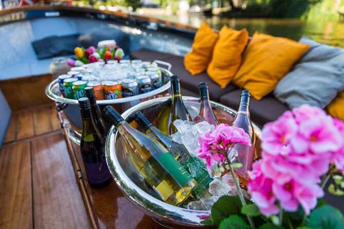Classic Salonboat Tour in Amsterdam Including Cheese and Wine - The canal ring belt, UNESCO views, and the names that matter