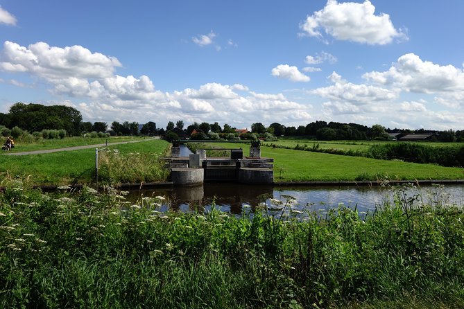 Countryside Bike Tour from Amsterdam: Cheese, Clogs & a Windmill - Getting started at Mikes Bike Tours, bikes, helmets, and a calm safety briefing