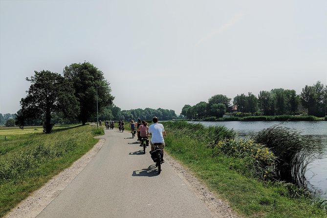 Countryside Bike Tour from Amsterdam: Cheese, Clogs & a Windmill - Timing, breaks, and what to bring for Dutch wind, rain, and cold