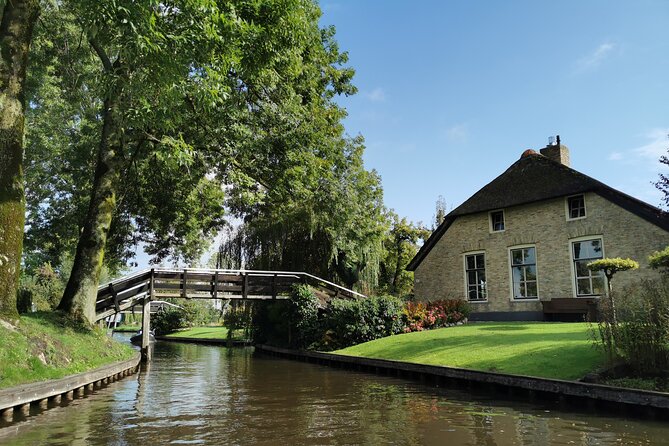 Day Tour Giethoorn, Afsluitdijk and Zaanse Schans with Boat Cruise - Small-group comfort: van seating and guide styles that make or break it