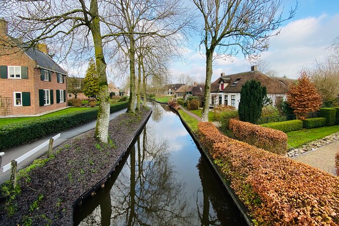 Day Tour Giethoorn, Afsluitdijk and Zaanse Schans with Boat Cruise - Giethoorn: included boat cruise plus 4 hours to wander