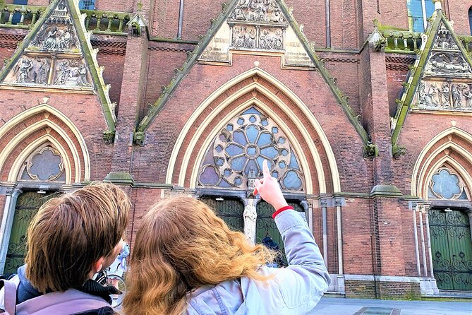 Discover Amsterdam's city center in this Outside Escape game tour - Stop 4, Bloemenmarkt: canal-side flower shops and a colorful reset