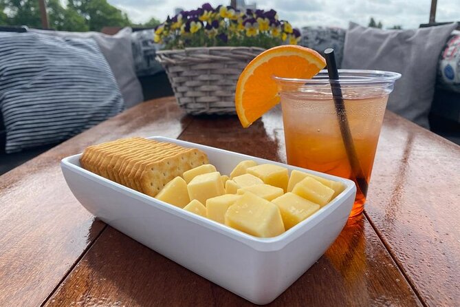 Dutch Cheese & Drinks Guided Amsterdam Boat Tour, All Inclusive - Munttoren, City-Wall Clues, and the Magere Brug Romance