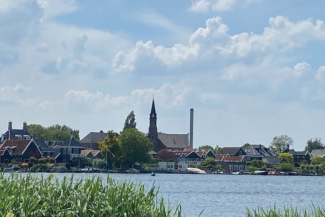 Escape Amsterdam: E-Bike to Zaanse Schans Windmills & Zaandam - What you get included: helmets, ponchos, and an e-bike that behaves