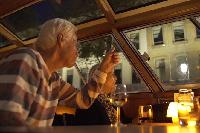 Evening Canal Cruise in Amsterdam with Wine & Cheese Option - The audio system reality: headphones, language choice, and what can go wrong