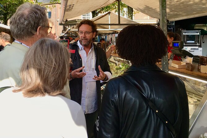 Exclusive Cheese Walk & Dutch Wine Discovery - Spui Book Market start: get your bearings the local way