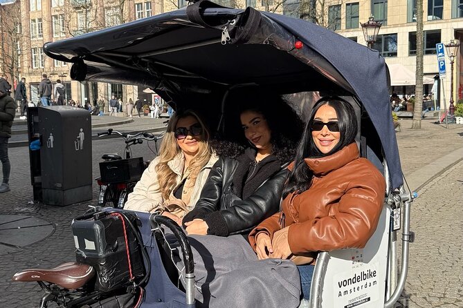 Explore Amsterdam in 75 Minutes – Pedicab Rickshaw City tour - Dam Square: The City Center Stop That Adds Structure