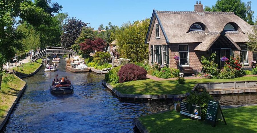 From Amsterdam: Giethoorn Day Trip with Small Electric Boat - Inside Giethoorn, why the village feels like it has its own rules