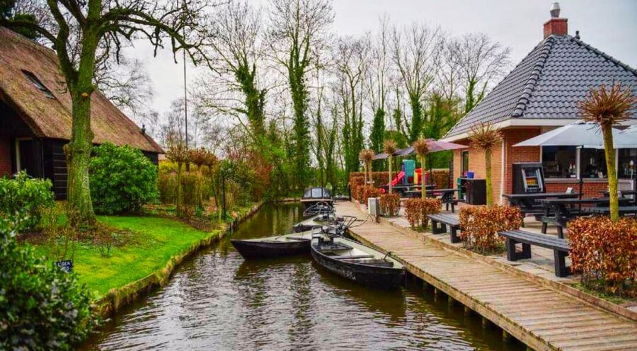 From Amsterdam: Giethoorn Guided Day Trip with Canal Cruise - Walking Giethoorn With a Local Guide: Bridges, Canals, Thatched Roofs